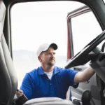 Professional truck driver from Windy Expedite ensuring safe cargo delivery.