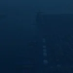 A wide-angle shot of a container terminal with high-speed cargo being transferred to expedited vehicles for the final mile.