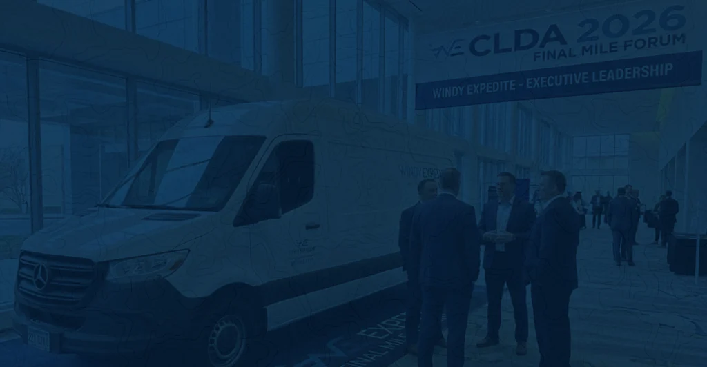 A professional presentation stage and networking area at a corporate logistics and supply chain conference.