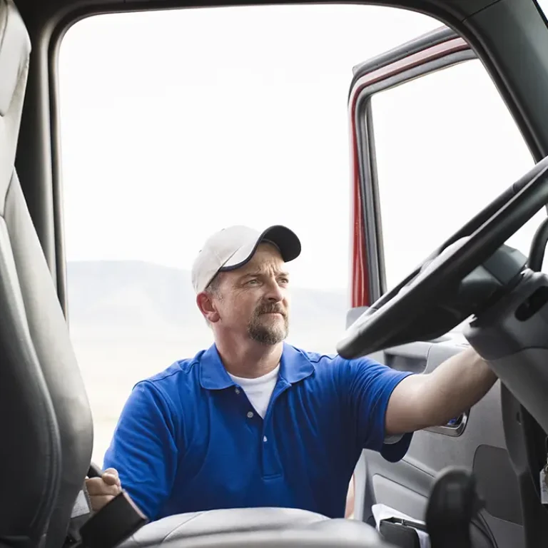 Professional truck driver from Windy Expedite ensuring safe cargo delivery.